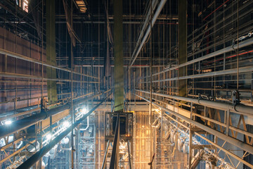 Technical equipment at the backstage of theater. Stage spot lighting rigging structure for a live musical theater events