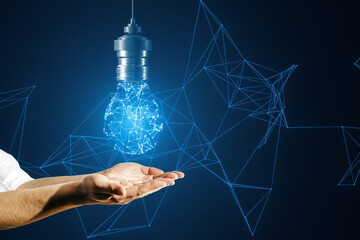 A hand presenting a digital light bulb concept with connected lines on a dark blue background