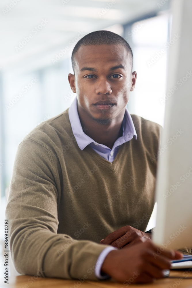 Poster business, man and serious portrait working, assertive and computer in creative workplace with web de