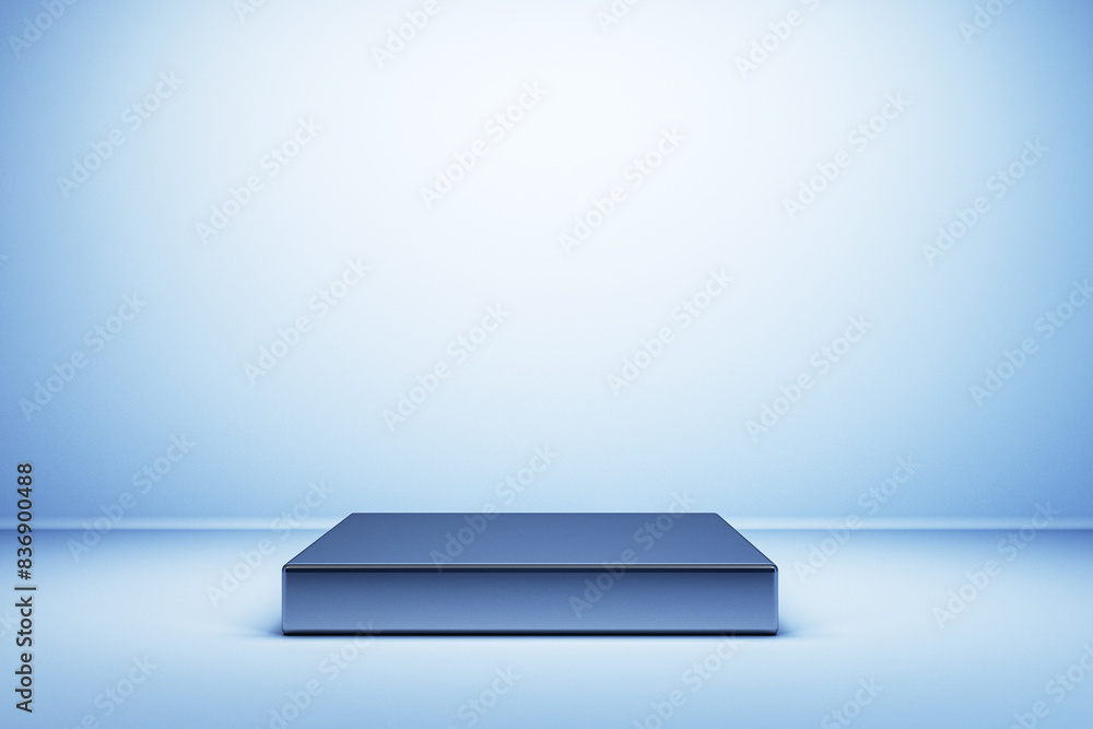 Poster a minimalist blue podium in an empty studio with a spotlight on the pedestal, against a blue backdro