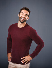 Studio, portrait and laughing of man, sweater and confidence in mockup space, pride and cardigan in...