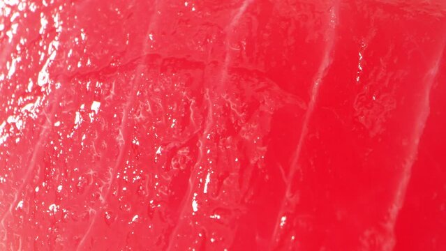 A vibrant close-up captures the freshness of sliced tuna, its crimson hue and silky texture tantalizing the senses. Delicate lines and glistening moisture affirm its superior quality.
