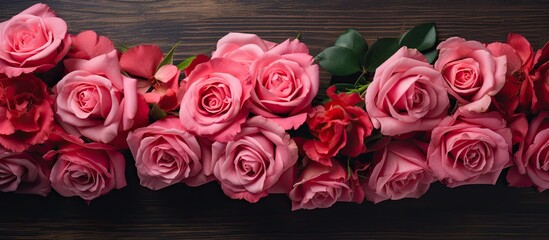 A beautiful congratulatory bouquet of roses with a copy space image, suitable for Valentine's Day, weddings, or birthdays, seen from the top view.