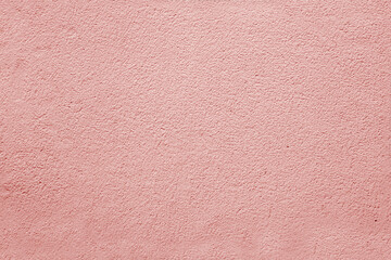 Fototapeta premium Texture of old shabby pink plaster.