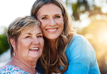 Happy, portrait and woman hugging her senior mother in nature at an outdoor park in summer. Smile,...