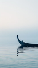 Fototapeta premium Lonely boat on misty lake at sunrise, tranquil scene