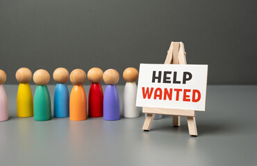 Queue and help wanted sign. Job candidates. Simplification of procedures for accepting foreign...