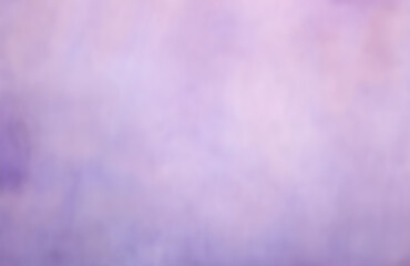 Pastel purple color blurred background. Abstract portrait backdrop for studio. Empty textured wall.