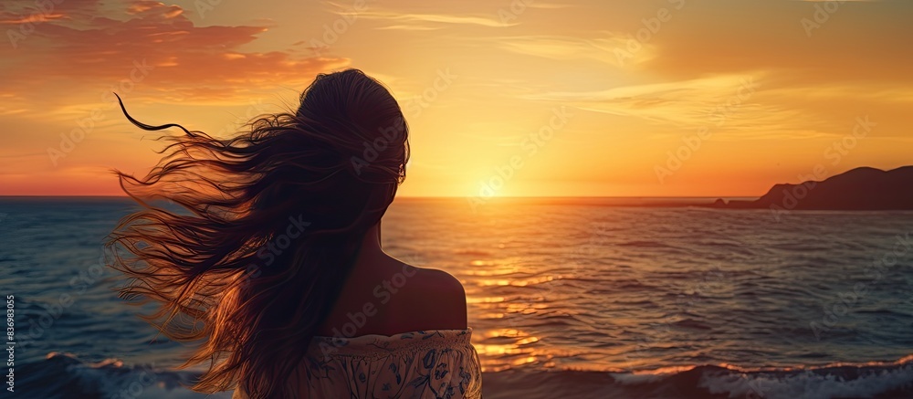 Poster woman enjoying a beautiful sunset with a mesmerizing view, captured in a serene moment with copy spa