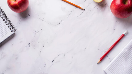 Pencils, notebook and apples on white table, top view, back to school banner