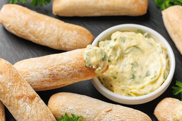 Stone baked ciabatta bread sticks with creamy garlic butter dip.