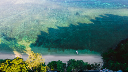 Paradise beach Phuket Patong. aerial top view amazing freedom beach small white sand beach with...