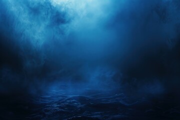Enigmatic and mysterious blue smoke background with dark and atmospheric abstract moody mist and fog texture. Perfect for cinematic. Ambient. And surreal digital art effects