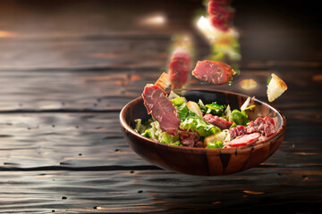 carne salada on wooden table