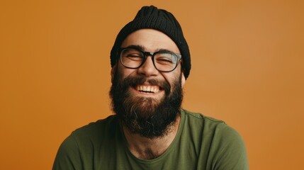 The smiling bearded man