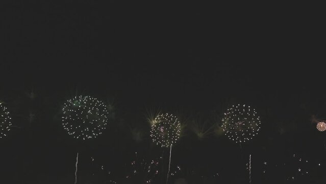 Awesome Real Huge Firework on Deep Black Background Sky on Fireworks festival. Colorful fireworks on 4th of July, Independence day in USA. High quality 4K slow mo video. ProRes422 10bit ungraded C-LOG