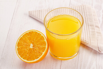 Sweet fresh orange juice in the glass