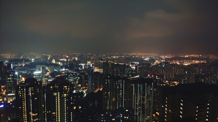 Obraz premium City Lights: Nighttime Urban Landscape with Luminous Details. A captivating nighttime cityscape showing the bustling urban life and colorful lights reflecting a vibrant city environment.