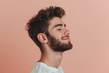 Obraz premium A close up of a man with beard and closed eyes looking to a side