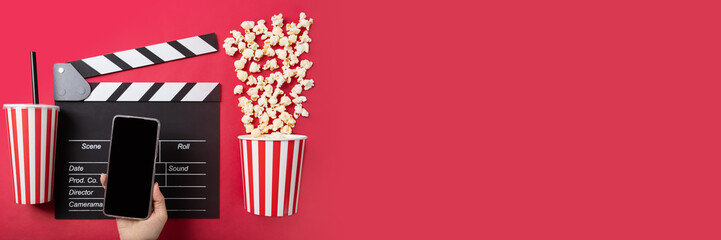 Cinema mobile app, tickets online, Popcorn bucket with soda cup and clapper board with phone,...