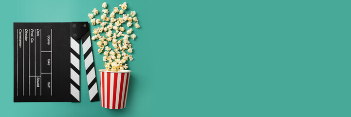 Cinema popcorn and clapper board, film blackboard, movie bucket pop corn