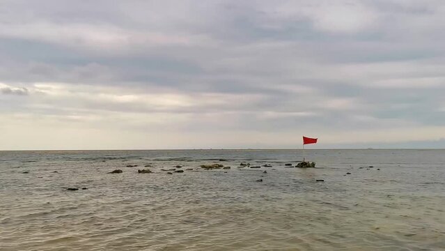 Red flag swimming prohibited high waves Playa del Carmen Mexico.