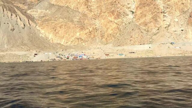 Boat ride in Attabad lake and rough mountains of Hunza nagar Pakistan 