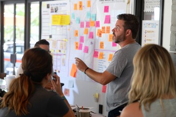 Project Manager Leading Kickoff Meeting with Diverse Team Discussing Goals and Timelines