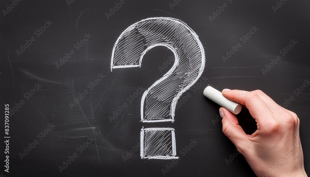 Aufkleber white question mark symbol drawn with chalk isolated over black. hand holding chalk. faq and qa.