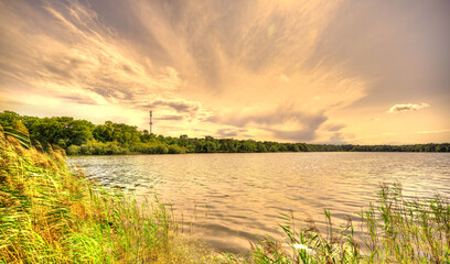 Sunset over the De IJzeren Man lake in the south of The Netherlands.
