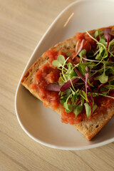 detail of toast with tomato