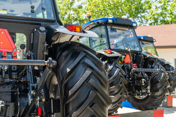 Row of agriultural tractors for sale