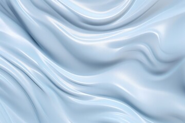 Fototapeta premium A blue fabric with a wave pattern. The fabric is smooth and shiny