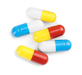 Many antibiotic pills isolated on white, top view