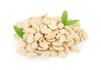 Fresh peeled peanuts and green leaves isolated on white