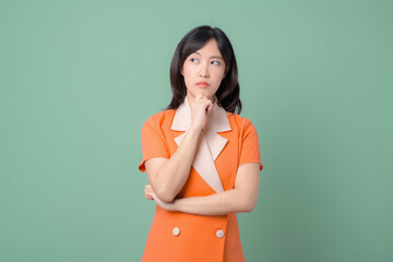 Woman thinking with hand on chin