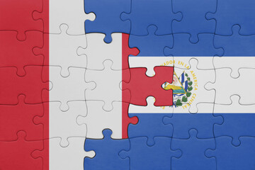 puzzle with the colourful national flag of el salvador and flag of peru .