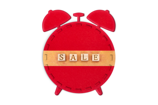 黄色いセールの英語ブロックのテープが貼られた赤い目覚まし時計