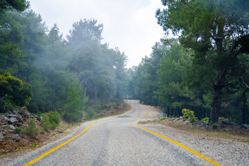 Road trip, view from car along to mountain roads and serpentines in mountain near Fethiye, Turkey