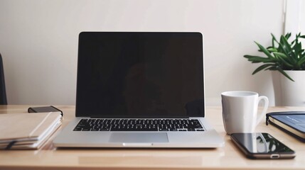 A minimalist workspace with a laptop, notebook, and coffee cup on a sleek desk, against a neutral backdrop