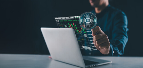 Businessman holding a magnifying glass with Artificial Intelligence (AI) in the futuristic business, Magnifying glass search of investing and stock market over a graph chart
