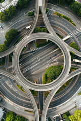 Aerial top view of multilevel empty junction ring road in sunny summer day