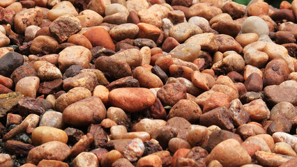 A pile of brown cobblestones
