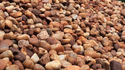 A pile of brown cobblestones