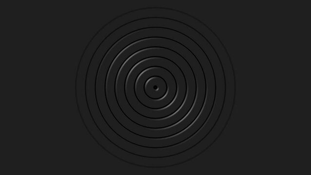 Abstract animated dark gray background. Indented circles moving outwards. 4k ready to loop