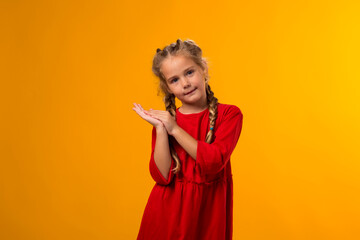 Girl clapping and applauding happy and joyful, smiling proud hands together