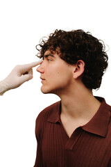 ENT doctor touching nose of patient before rhinoplasty or septoplasty surgery. Rhinoplasty to...