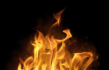 orange hot sparks in smoke isolated on black