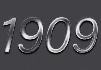 Chrome metal 3D number design of 1909 on grey background.