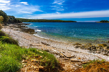 Empty rocky beaches inaccessible to tourists on the Istrian coast in Croatia, near Rovinj